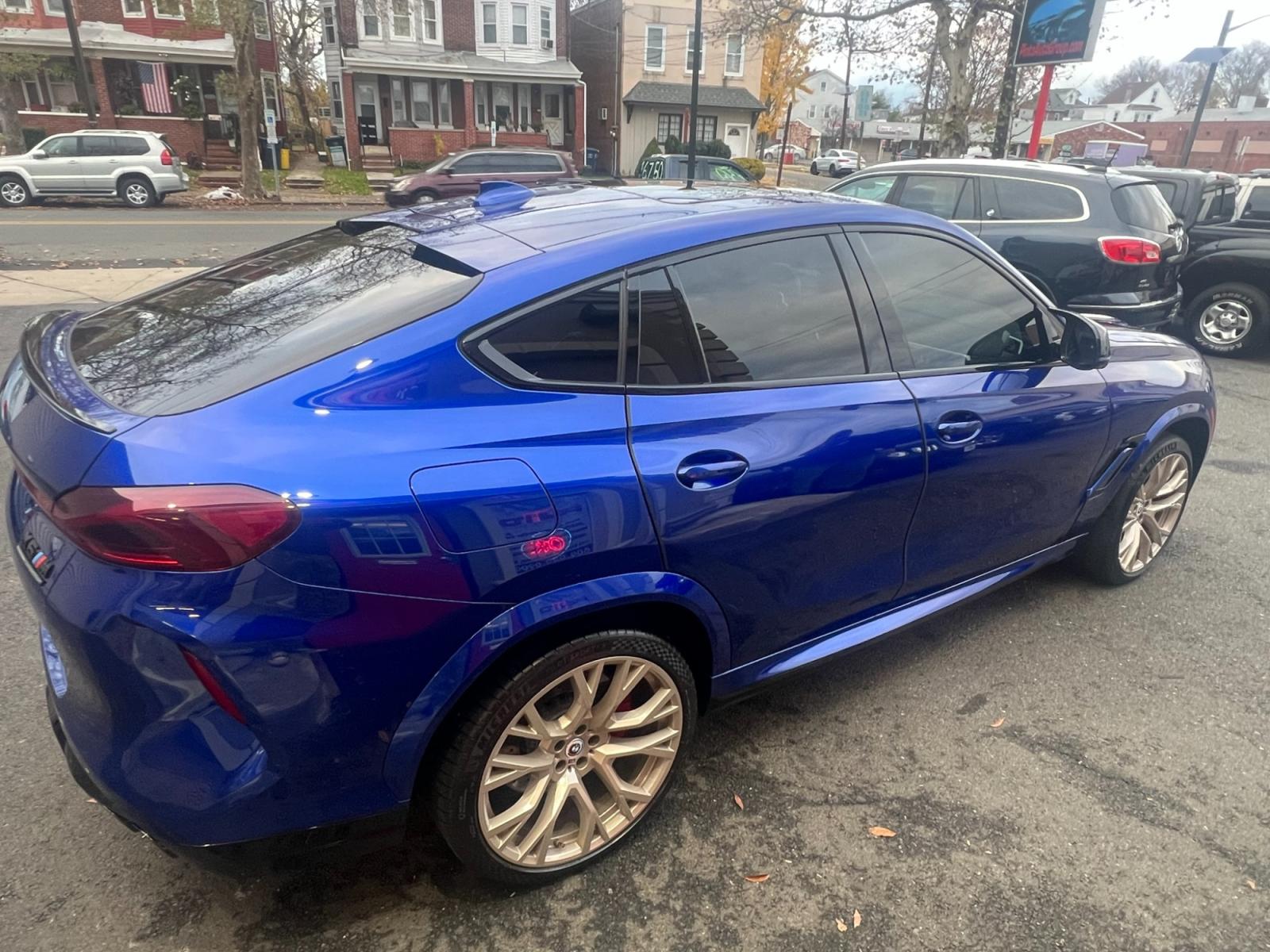 2022 Blue /Red/Black BMW X6 M Base (5YMCY0C07N9) with an 4.4L V8 DOHC 32V engine, 8A transmission, located at 1018 Brunswick Ave, Trenton, NJ, 08638, (609) 989-0900, 40.240086, -74.748085 - Holy Cow and Wow!!...That is the description on this absolutely stunning BMW X6 M Competition! Ordered by Anthony himself with the best color choice of Marina Bay Blue metallic and Red Interior to stand out on the road and to any enthusiast of the BMW X series! Executive Pkg. includes Remote Start, - Photo #26